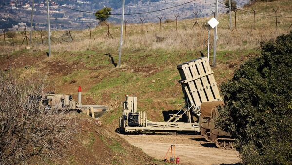An Iron Dome anti-missile system is seen near the border area between Israel and Syria, in the Israeli-occupied Golan Heights, 18 November 2020. - Sputnik International