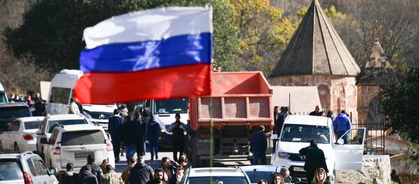 Russian flag waves near the Dadivank Armenian monastery, in the self-proclaimed Nagorno-Karabakh Republic Russian flag waves near the Dadivank Armenian monastery, in the self-proclaimed Nagorno-Karabakh Republic - Sputnik International