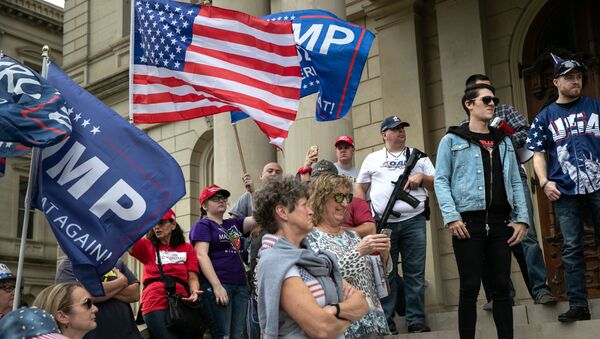 Trump supporters demonstrate at the Michigan state capitol on November 08, 2020 in Lansing, Michigan. Militia members had pledged to attend the Stop the Steal demonstration, claiming the presidential election had been stolen. - Sputnik International