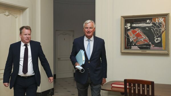 Britain's chief negotiator David Frost (L) and EU's Brexit negotiator Michel Barnier arrive for a working breakfast after a seventh round of talks, in Brussels on August 21, 2020.  - Sputnik International