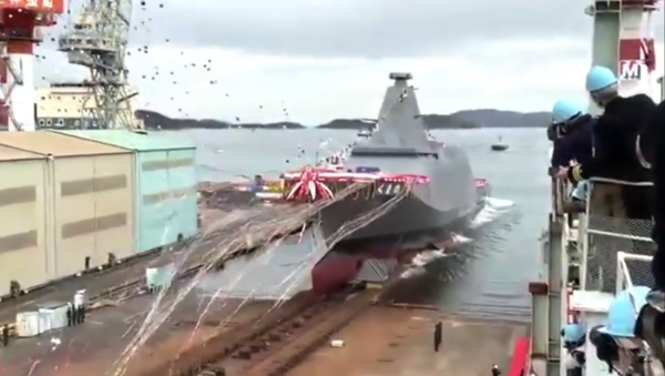Amid a flurry of streamers and balloons, Japan's first 30FFM-class frigate is launched at the Mitsui shipyard in Tamano, Okayama Prefecture, on November 19, 2020 - Sputnik International