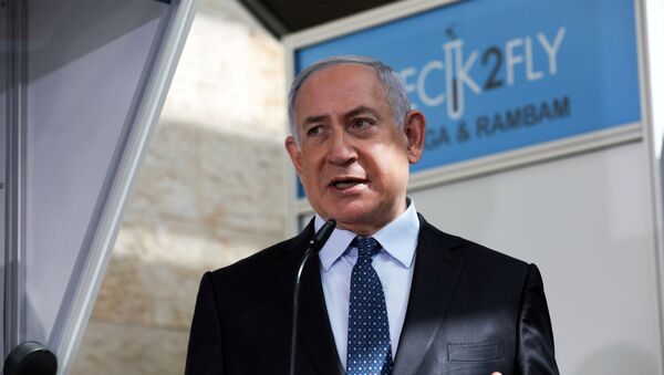Israeli Prime Minister Benjamin Netanyahu visits the new COVID-19 checking system at Ben-Gurion International Airport, near Tel Aviv, Israel  November 9, 2020. - Sputnik International