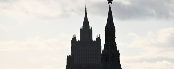 A view of the Russian Foreign Ministry and one of the Kremlin towers A view of the Russian Foreign Ministry and one of the Kremlin towers - Sputnik International