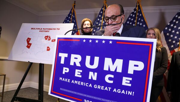Former New York City Mayor Rudy Giuliani, personal attorney to U.S. President Donald Trump, speaks as he holds a news conference about the 2020 U.S. presidential election results with fellow Trump attorneys Sidney Powell and Jenna Ellis at Republican National Committee headquarters in Washington, U.S., November 19, 2020 - Sputnik International