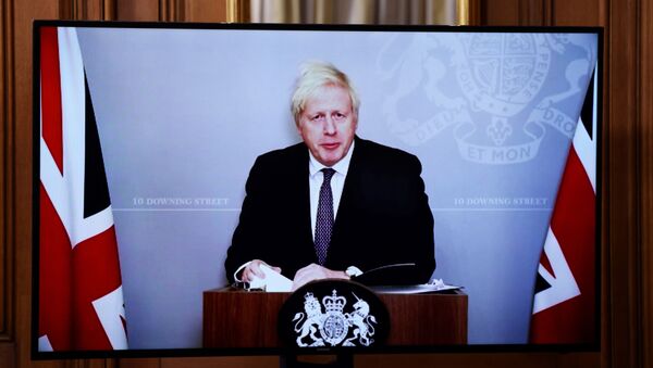 News conference about the ongoing situation with the coronavirus disease (COVID-19), in London with Prime Minister Boris Johnson - Sputnik International