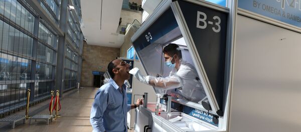 People demonstrate operating of the coronavirus disease (COVID-19) checking system, at Ben Gurion International airport in Lod, Israel November 9, 2020. People demonstrate operating of the coronavirus disease (COVID-19) checking system, at Ben Gurion International airport in Lod, Israel November 9, 2020. - Sputnik International