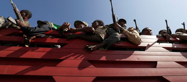Members of Amhara region militias ride on their truck as they head to the mission to face the Tigray People's Liberation Front (TPLF), in Sanja, Amhara region near a border with Tigray, Ethiopia November 9, 2020 Members of Amhara region militias ride on their truck as they head to the mission to face the Tigray People's Liberation Front (TPLF), in Sanja, Amhara region near a border with Tigray, Ethiopia November 9, 2020 - Sputnik International
