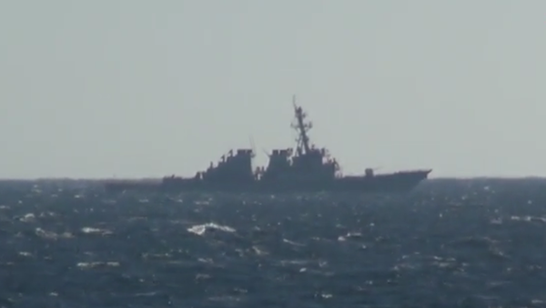 The US Navy destroyer USS John C. McCain, filmed from the deck of the Russian frigate Admiral Vinogradov as the McCain performed a freedom of navigation operation in Russia's Peter the Great Gulf on November 24, 2020 - Sputnik International