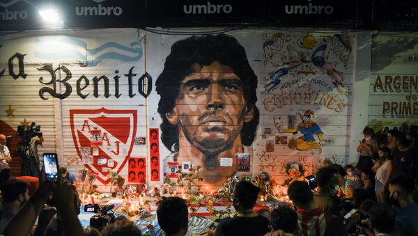 People gather to mourn the death of soccer legend Diego Maradona, outside the Diego Armando Maradona stadium, in Buenos Aires, Argentina November 25, 2020 - Sputnik International