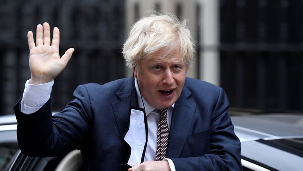 Britain's Prime Minister Boris Johnson seen in public for the first time since his self-isolation ended, arrives at Downing Street during the coronavirus disease (COVID-19) outbreak in London, Britain, November 26, 2020.  - Sputnik International