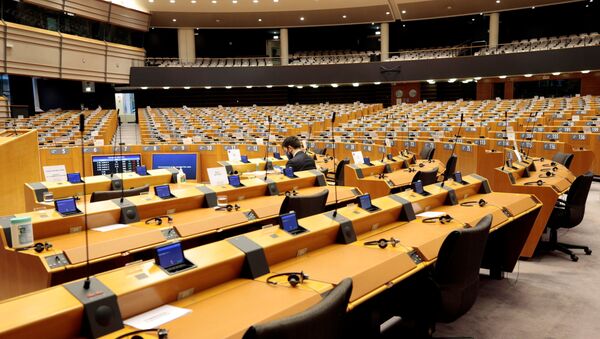 A member of the European Parliament sits at the start of a plenary session at the European Parliament in Brussels, Belgium November 25, 2020.  - Sputnik International