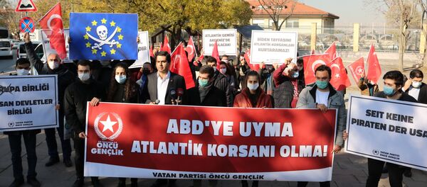 Members of the Vatan Partisi (Patriotic Party) gather near the German Embassy in Ankara, Turkey, to protest against German soldiers boarding and searching a Turkish vessel on behalf of an EU military mission in the Mediterranean Sea, 27 November 2020. Members of the Vatan Partisi (Patriotic Party) gather near the German Embassy in Ankara, Turkey, to protest against German soldiers boarding and searching a Turkish vessel on behalf of an EU military mission in the Mediterranean Sea, 27 November 2020. - Sputnik International