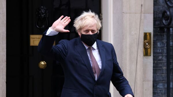 Britain's Prime Minister Boris Johnson seen in public for the first time since his self-isolation ended, leaves Downing Street during the coronavirus disease (COVID-19) outbreak in London, Britain, November 26, 2020. - Sputnik International