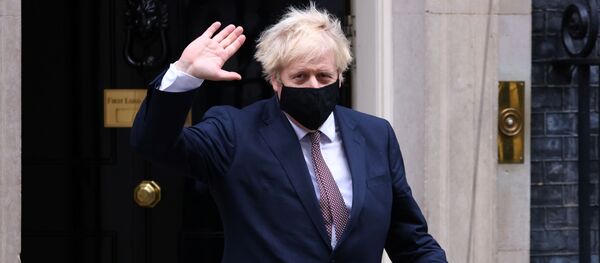 Britain's Prime Minister Boris Johnson seen in public for the first time since his self-isolation ended, leaves Downing Street during the coronavirus disease (COVID-19) outbreak in London, Britain, November 26, 2020. - Sputnik International