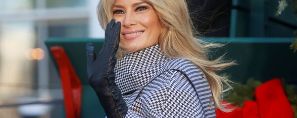 U.S. first lady Melania Trump departs after welcoming the arrival of the White House Christmas Tree  outside the White House in Washington, U.S., November 23, 2020. - Sputnik International