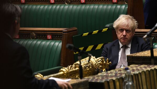 Britain's Prime Minister Boris Johnson attends a session on COVID-19 situation update at the House of Commons in London, Britain November 26, 2020. - Sputnik International