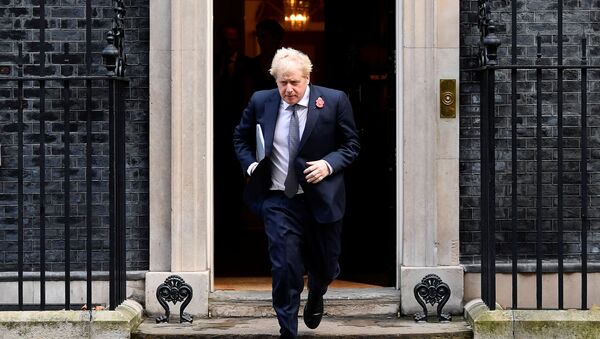 Britain's Prime Minister Boris Johnson leaves Downing Street to attend a cabinet meeting at the Foreign and Commonwealth Office (FCO) in London, Britain November 10, 2020.  - Sputnik International