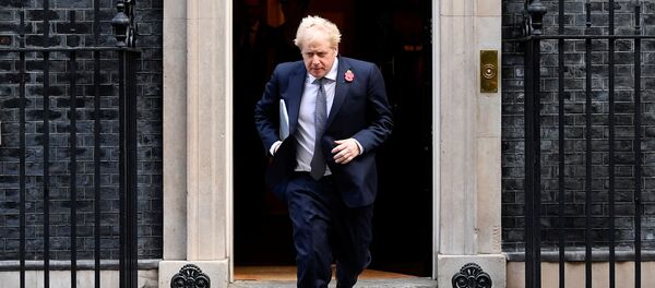 Britain's Prime Minister Boris Johnson leaves Downing Street to attend a cabinet meeting at the Foreign and Commonwealth Office (FCO) in London, Britain November 10, 2020. Britain's Prime Minister Boris Johnson leaves Downing Street to attend a cabinet meeting at the Foreign and Commonwealth Office (FCO) in London, Britain November 10, 2020. - Sputnik International