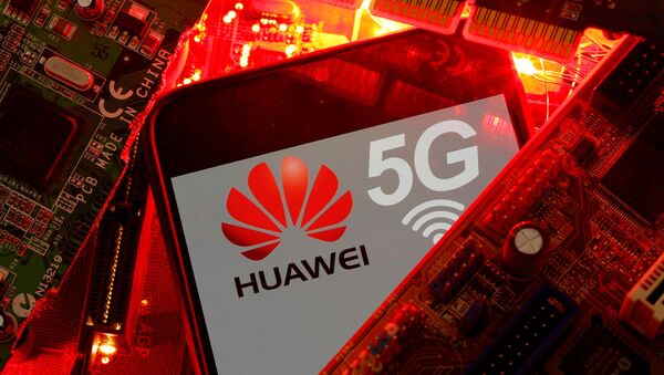 A smartphone with the Huawei and 5G network logo on a PC motherboard in this illustration taken 29 January 2020. - Sputnik International