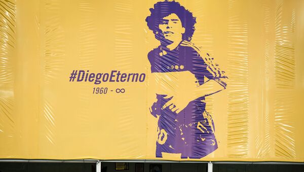 A flag in Buenos Aires, Argentina bearing the legend Diego Eterno was placed on top of the personal box that Diego Maradona, his family and friends used for years, 29 November 2020. - Sputnik International