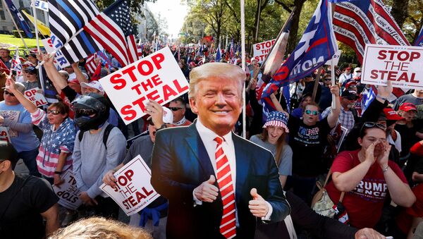 FILE PHOTO: A cut-out of US President Donald Trump is pictured as supporters take part in a protest against the results of the 2020 presidential election in Atlanta, Georgia, US, 21 November 2020. - Sputnik International