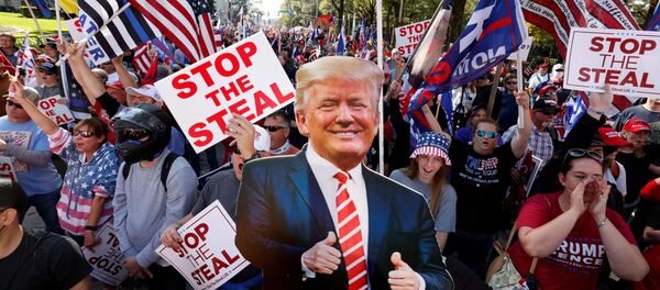 FILE PHOTO: A cut-out of US President Donald Trump is pictured as supporters take part in a protest against the results of the 2020 presidential election in Atlanta, Georgia, US, 21 November 2020. FILE PHOTO: A cut-out of US President Donald Trump is pictured as supporters take part in a protest against the results of the 2020 presidential election in Atlanta, Georgia, US, 21 November 2020. - Sputnik International