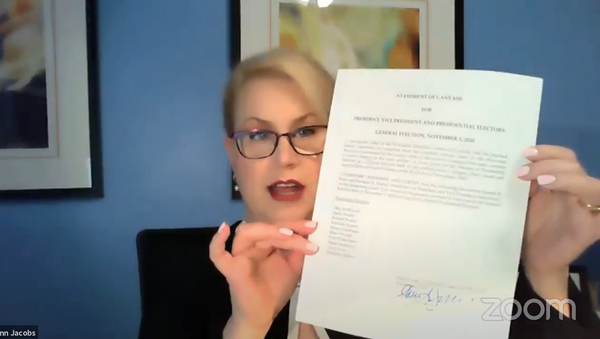 Screenshot from the video showing the head of Wisconsin Election Commission Ann Jacobs signing the official state determination of the results of the 3 November, 2020 election and the canvass - Sputnik International