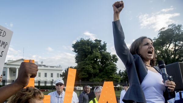 Center for American Progress President Neera Tanden speaks at a protest outside the White House, Tuesday, July 17, 2018, in Washington - Sputnik International