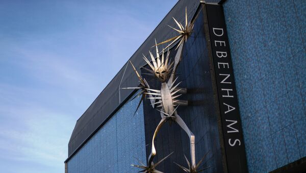 A sculpture on Debenhams' building is seen amidst the outbreak of the coronavirus disease (COVID-19), in Hanley, Stoke-on-Trent, Britain December 1, 2020. - Sputnik International