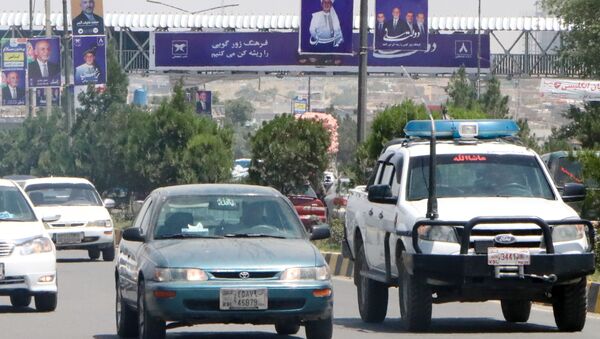 Election posters of Afghan presidential candidate and head of the ruling party Mohammad Ashraf Ghani at the highway in Kabul. - Sputnik International