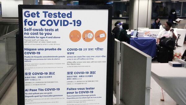 A sign is pictured at a test checkpoint at Pennsylvania Station the day before Thanksgiving during the coronavirus disease (COVID-19) pandemic in the Manhattan area of New York City, New York, U.S., November 25, 2020.  - Sputnik International