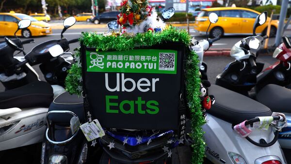 Christmas decorations can be seen on a Uber eats motobike in Taipei, Taiwan, November 26, 2020. - Sputnik International