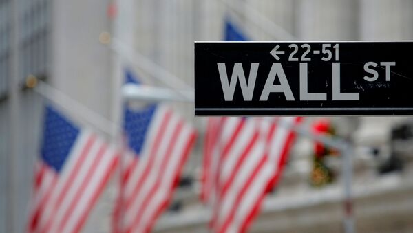 A street sign for Wall Street is seen outside the New York Stock Exchange (NYSE) in Manhattan, New York City, U.S. December 28, 2016. - Sputnik International