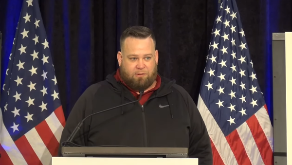 Screenshot from the video of The Amistad Project press conference, showing a truck driver Jesse Morgan delivering his remarks regarding the alleged US election fraud - Sputnik International