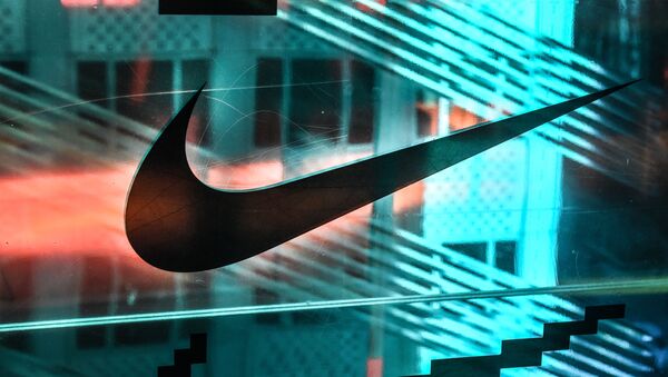 NEW YORK, NY - DECEMBER 20: A Nike logo is seen at the Nike flagship store on 5th Ave. on December 20, 2019 in New York City - Sputnik International