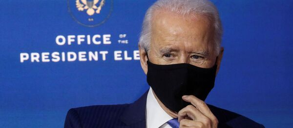 U.S. President-elect Joe Biden listens after announcing nominees and appointees to serve on his economic policy team at his transition headquarters in Wilmington, Delaware, U.S., December 1, 2020 U.S. President-elect Joe Biden listens after announcing nominees and appointees to serve on his economic policy team at his transition headquarters in Wilmington, Delaware, U.S., December 1, 2020 - Sputnik International
