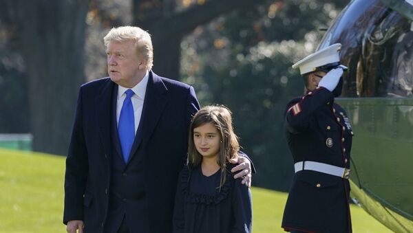 President Donald Trump walks with his granddaughter Arabella Kushner on the South Lawn of the White House in Washington, Sunday, Nov. 29, 2020 - Sputnik International