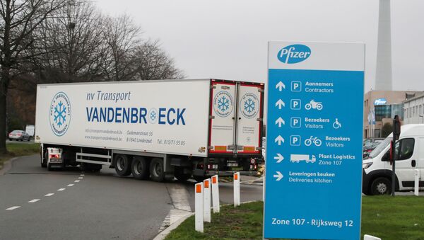 A refrigerated truck leaves the Pfizer factory in Puurs, Belgium December 3, 2020.  - Sputnik International