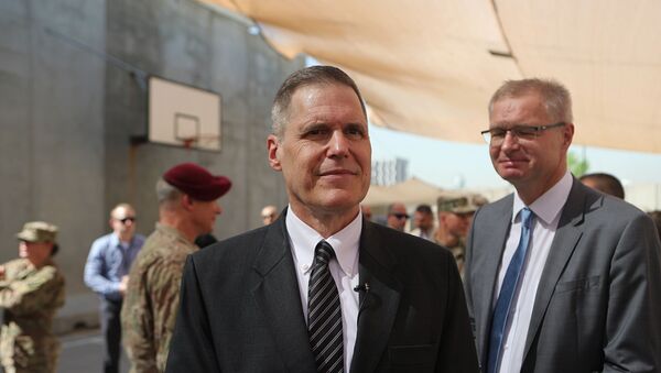 Matthew Tueller, center, the U.S. ambassador to Iraq, attends a transfer authority ceremony at Union III, base in Baghdad, Iraq, Saturday, Sept. 14, 2019. U.S. Army Lt. Gen. Pat White, III Armored Corps Commanding General, assumed command of the Combined Joint Task Force-Operation Inherent Resolve from U.S. Army Lt. Gen. Paul LaCamera - Sputnik International