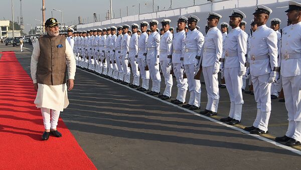 In this photograph released by the Indian Navy on December 14, 2017, Prime Minister Narendra Modi inspects a guard of honour during an event to commission the INS Kalvari Scorpene-class submarine into the Indian Navy at the naval dockyard in Mumbai - Sputnik International