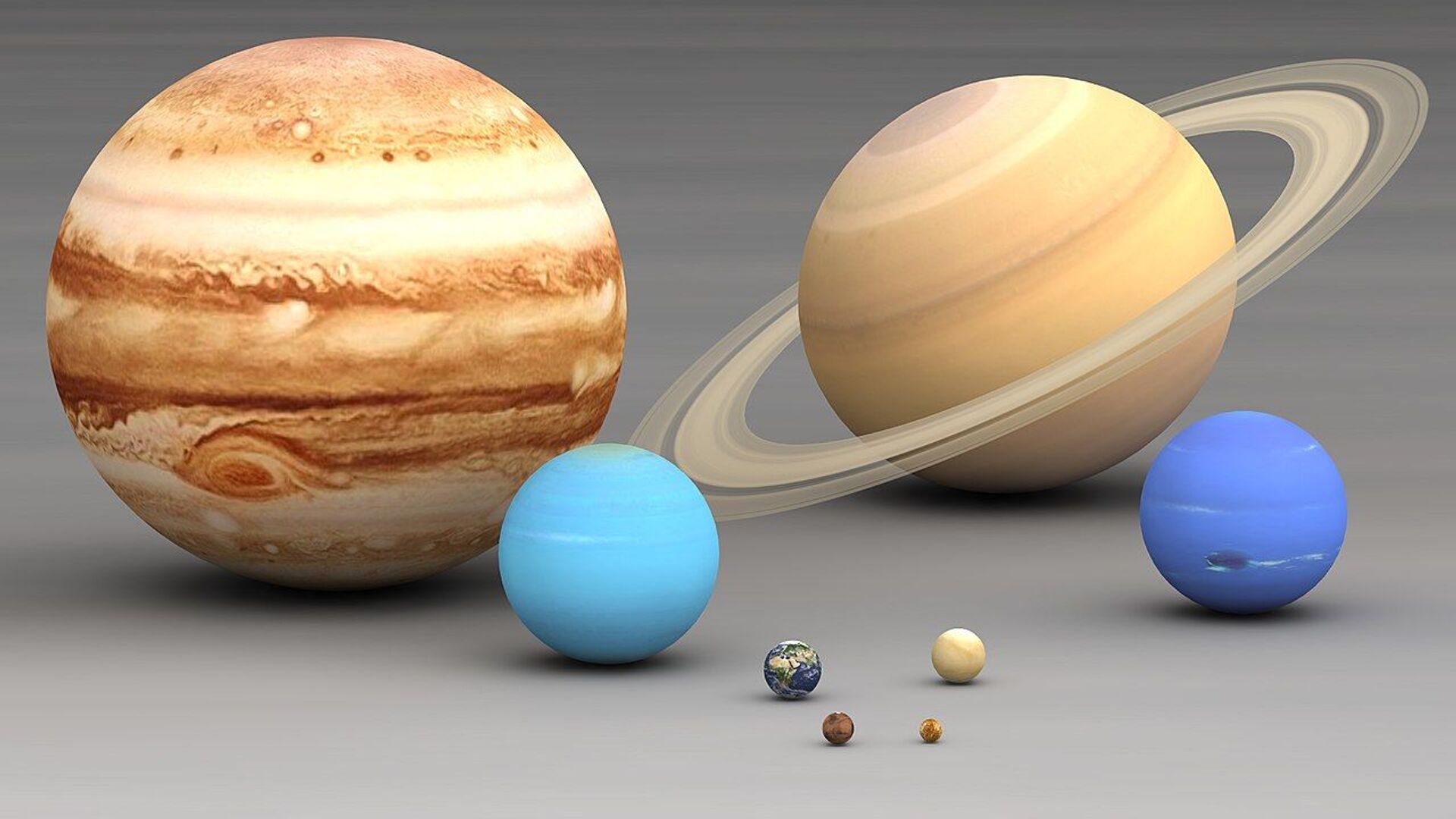 Solar system planets size comparison. Largest to smallest are pictured left to right, top to bottom: Jupiter, Saturn, Uranus, Neptune, Earth, Venus, Mars, Mercury - Sputnik International, 1920, 31.05.2022