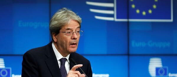 European Commissioner for Economy Paolo Gentiloni speaks during an online news conference following a Eurogroup video conference meeting at the European Council headquarters in Brussels, Belgium November 30, 2020. - Sputnik International