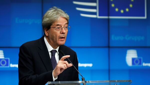 European Commissioner for Economy Paolo Gentiloni speaks during an online news conference following a Eurogroup video conference meeting at the European Council headquarters in Brussels, Belgium November 30, 2020. - Sputnik International