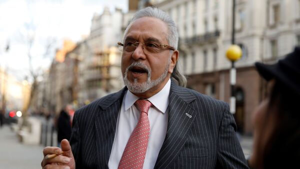 Indian tycoon Vijay Mallya leaves the Royal Courts of Justice, Britain's High Court, in central London on February 11, 2020, after attending a hearing into his appeal against his extradition to India - Sputnik International