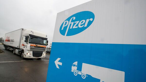 FILE PHOTO: A refrigerated truck leaves the Pfizer plant in Puurs - Sputnik International