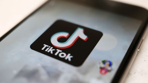 A logo of a smartphone app TikTok is seen on a user post on a smartphone screen Monday, Sept. 28, 2020, in Tokyo - Sputnik International