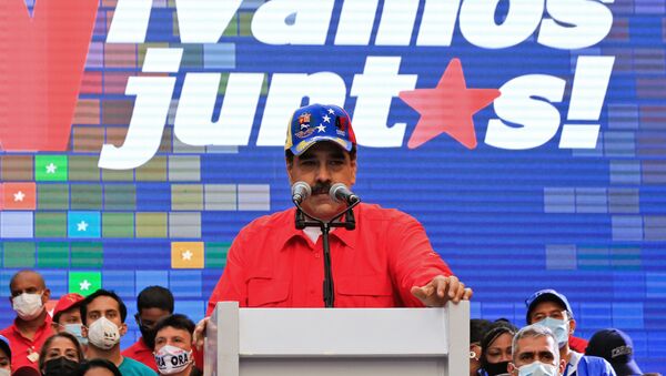 Handout picture released by the Venezuelan Presidency showing Venezuela's President Nicolas Maduro speaking during a campaign rally in Caracas, on December 3, 2020, ahead of the weekend's parliamentary election - Sputnik International