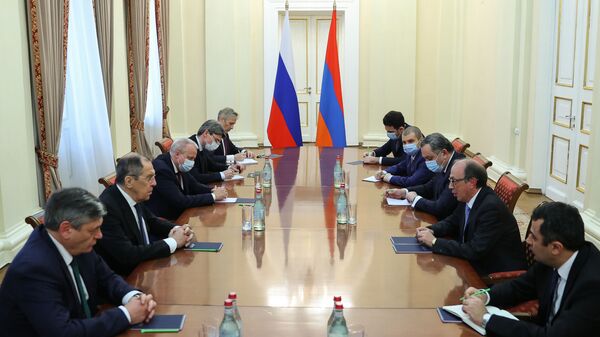 In this handout photo released by Russian Foreign Ministry, Russian Foreign Minister Sergei Lavrov attends a meeting with his Armenian counterpart Ara Aivazian, in Yerevan, Armenia - Sputnik International