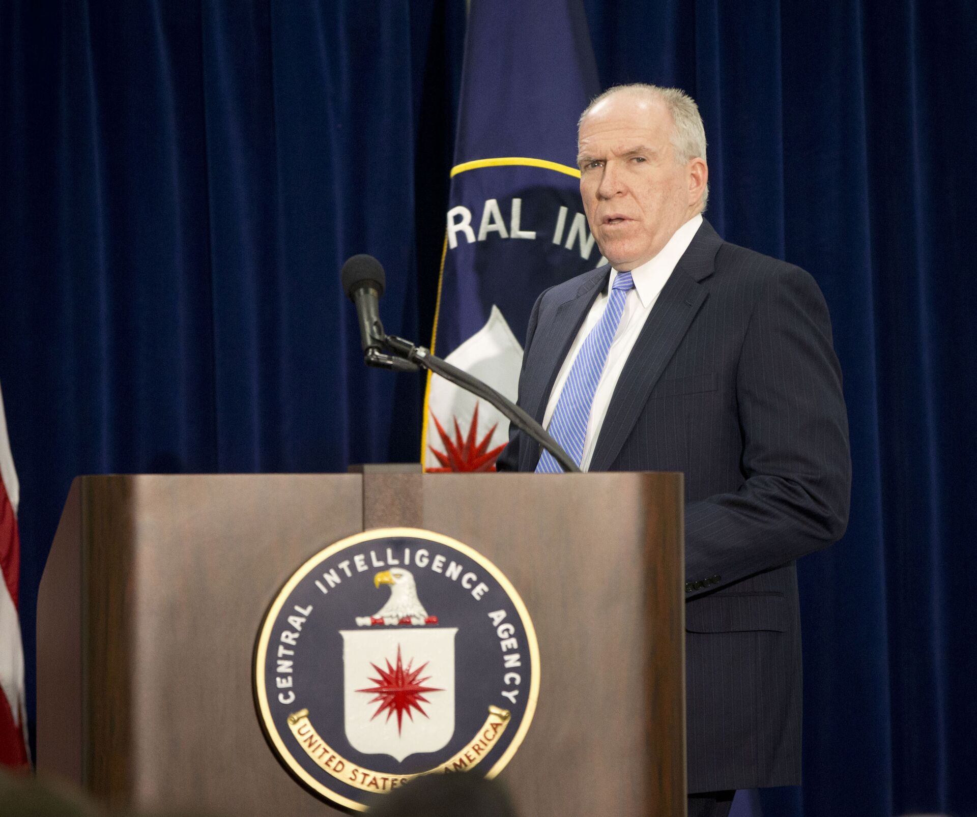Central Intelligence Director (CIA) Director John Brennan walks to his podium to begin a news conference at CIA Headquarters in Langley, Va., Thursday, Dec. 11, 2014 - Sputnik International, 1920, 23.05.2022
