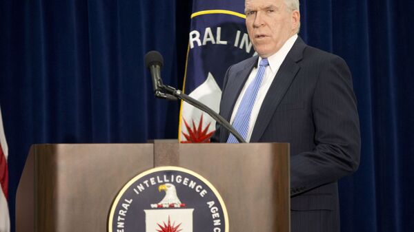 Central Intelligence Director (CIA) Director John Brennan walks to his podium to begin a news conference at CIA Headquarters in Langley, Va., Thursday, Dec. 11, 2014 - Sputnik International